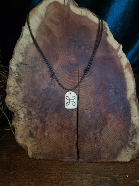 Celtic shield knot human bone necklace