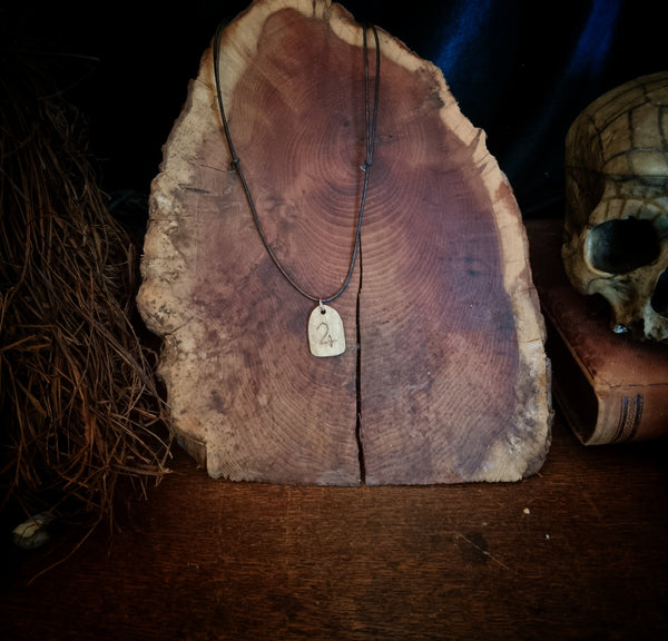 Jupiter alchemy symbol carved into human bone necklace (made to order)
